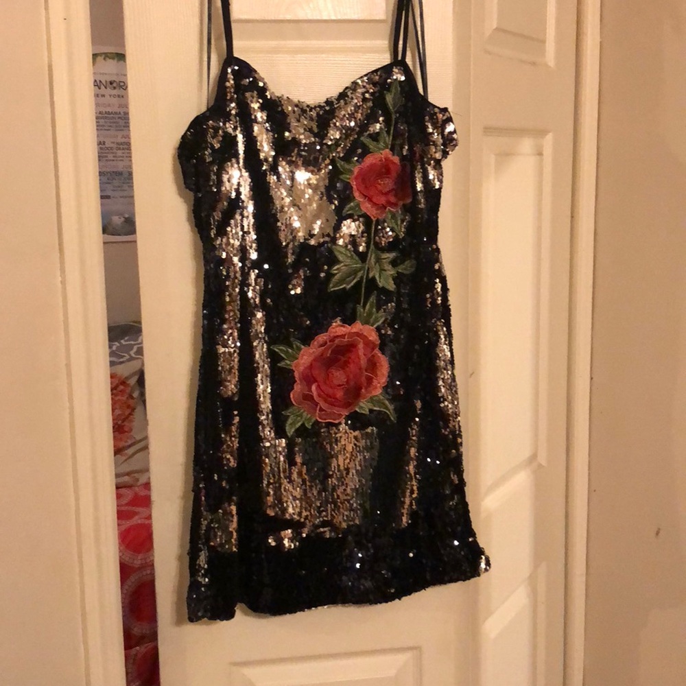 Sequined mini dress with flower embellishments